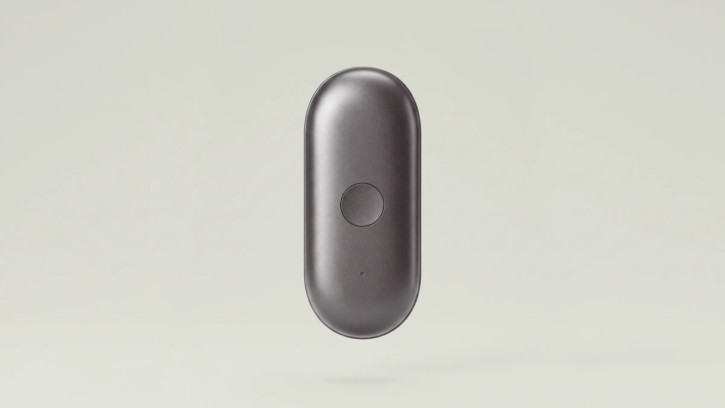 SILO AI wearable AI device in graphite floating on a neutral background – product CGI by IAS Creative